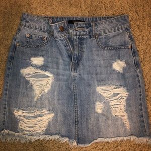 Super distressed mini jean skirt